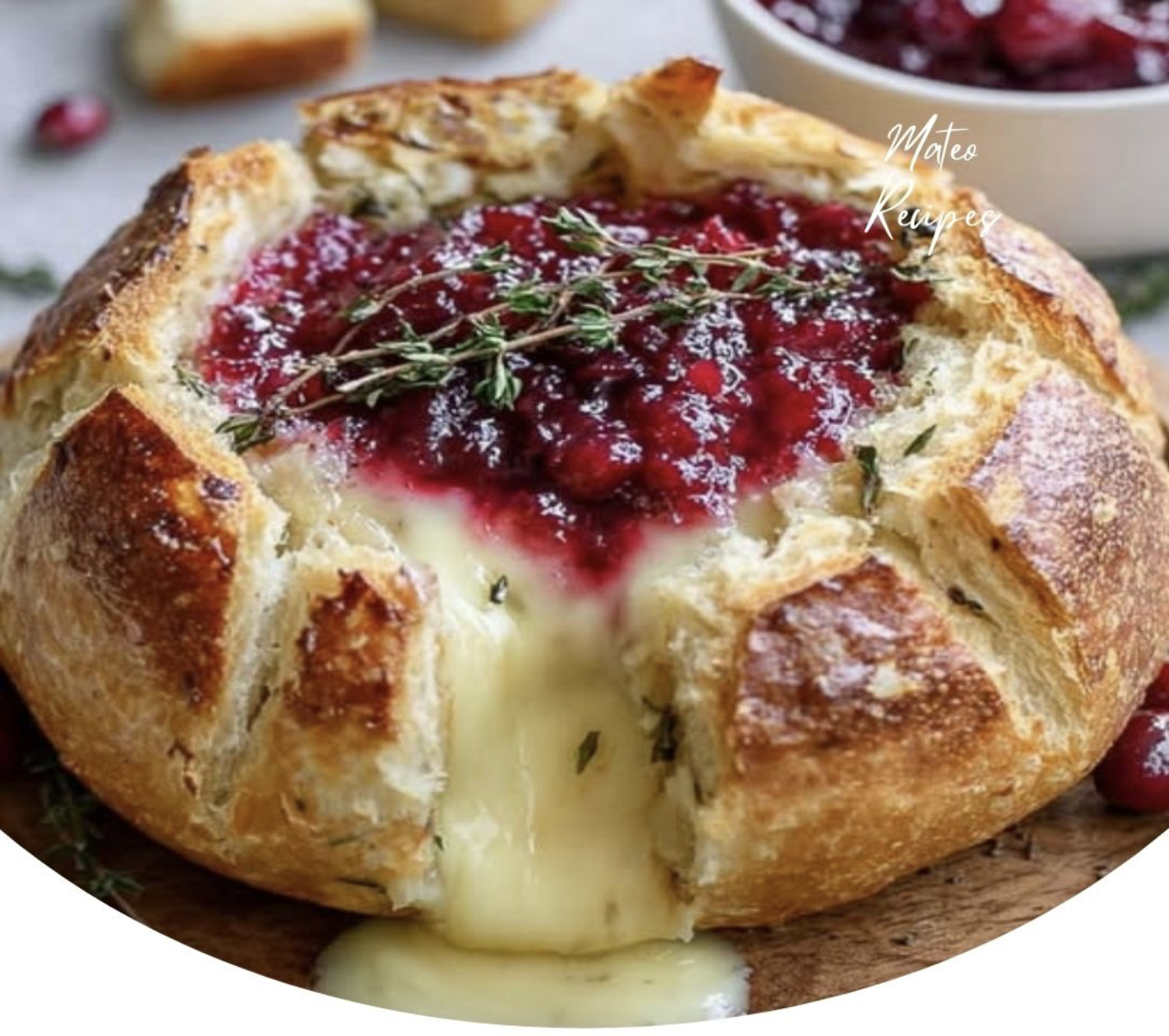 Baked Brie in Bread Bowl with Cranberry Sauce and Thyme