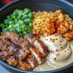 A delicious plate of Spicy Chicken Ramen Bowl with Creamy Sauce
