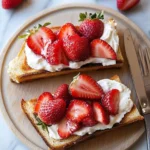 A delicious plate of Strawberry Cheesecake Toast